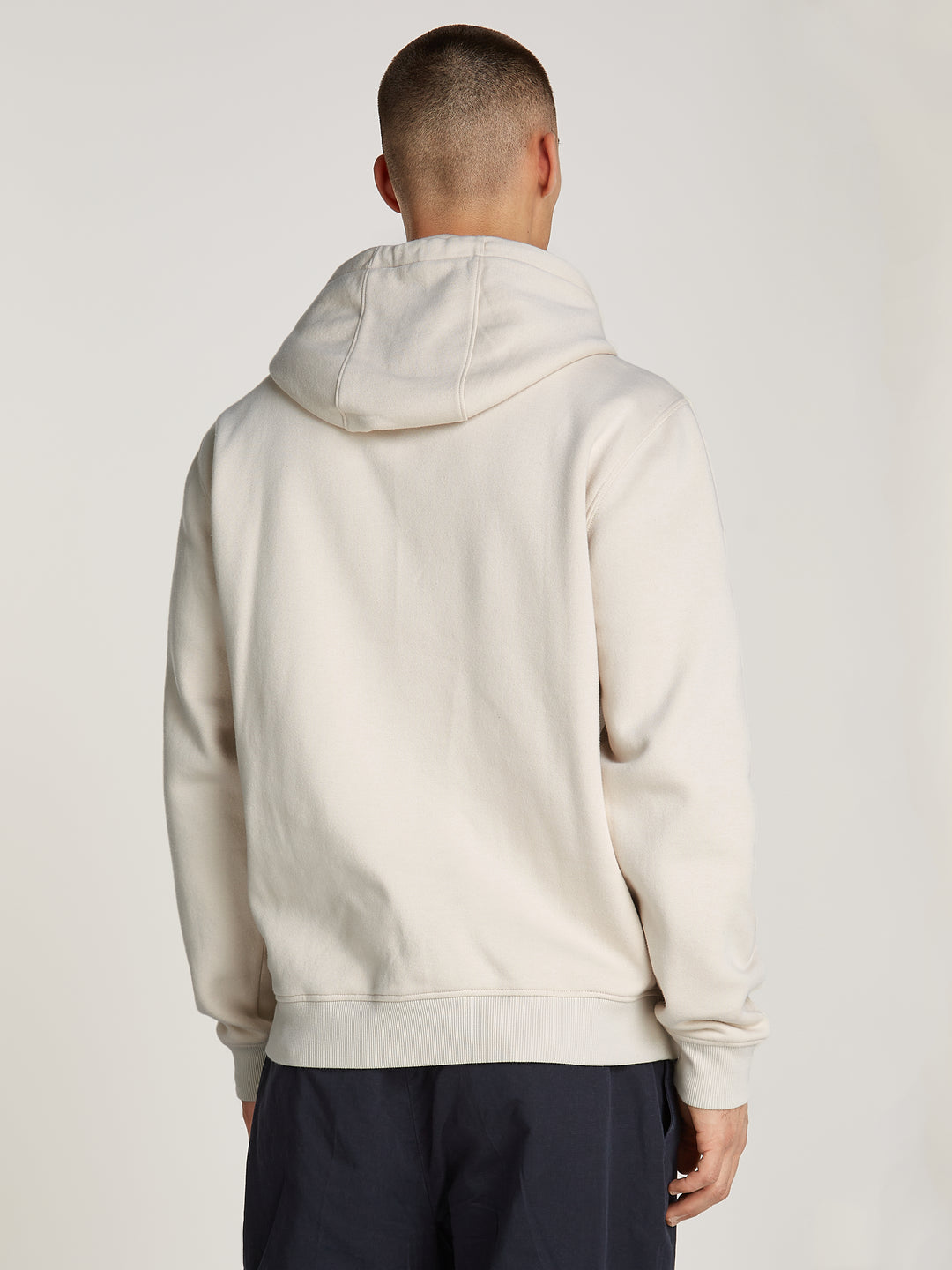 TJM REG S FLAG HOODIE - NEWSPRINT