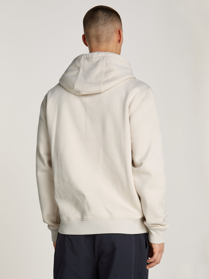 TJM REG S FLAG HOODIE - NEWSPRINT