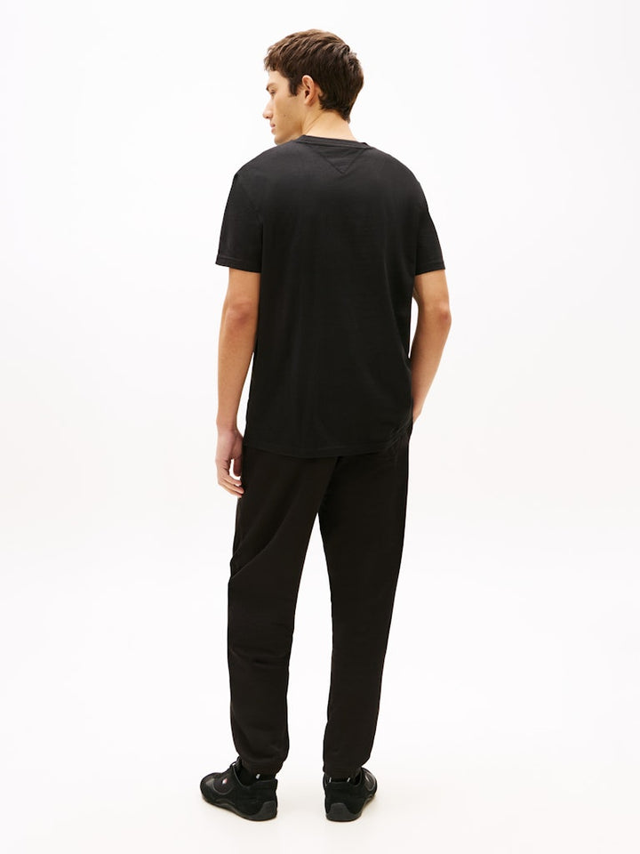 TOMMY JEANS REG LINEAR LOGO TEE - BLACK/SUN KISS