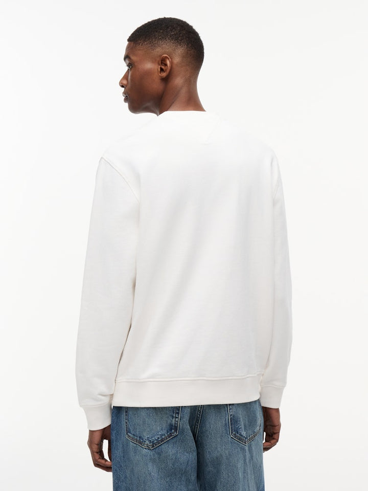 TOMMY JEANS GRAPHIC CREWNECK - ANICENT WHITE