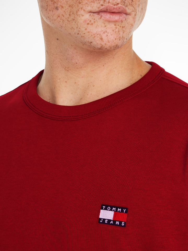 TJM REG BADGE TEE EXT - MAGMA RED