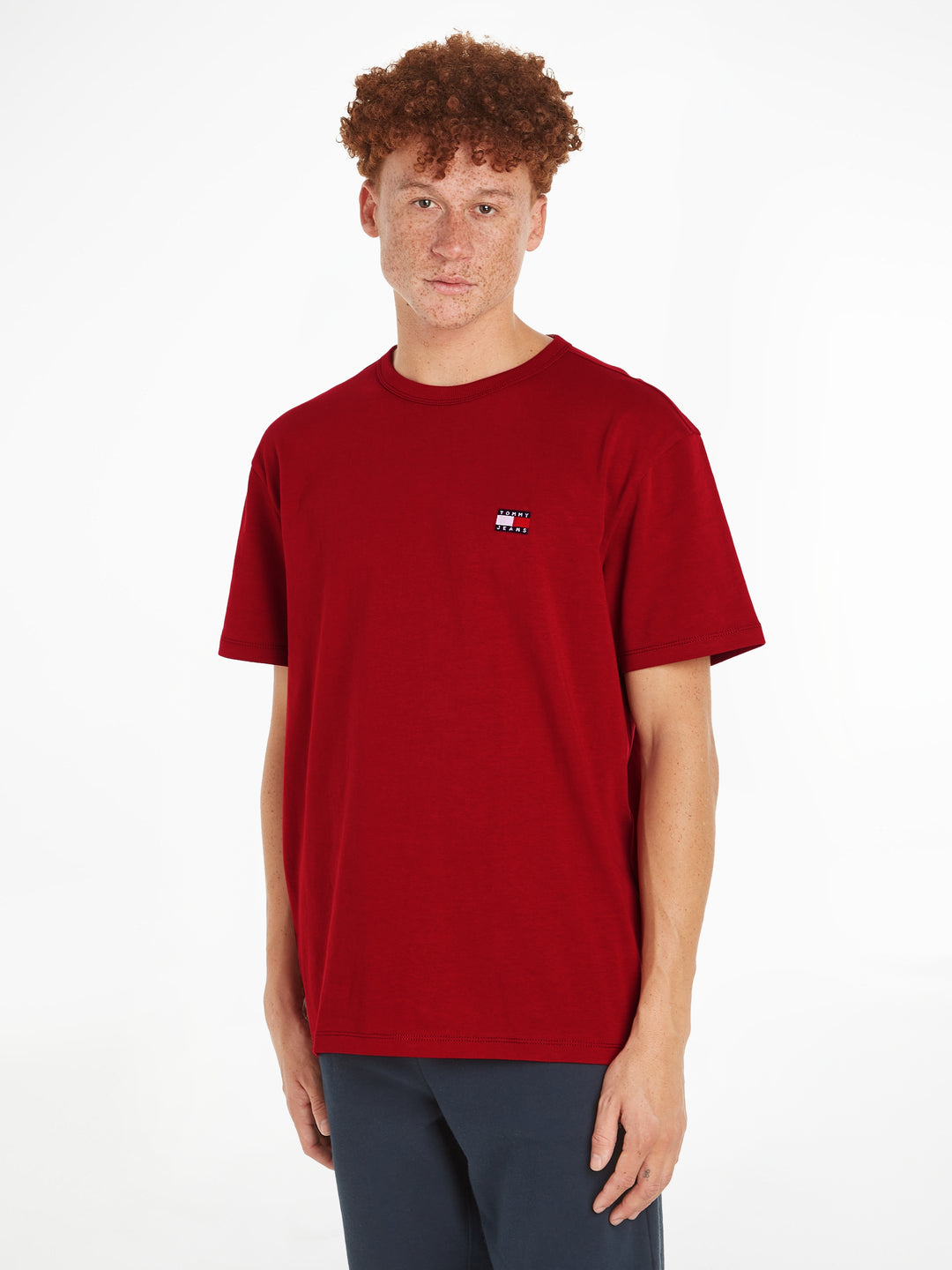 TJM REG BADGE TEE EXT - MAGMA RED