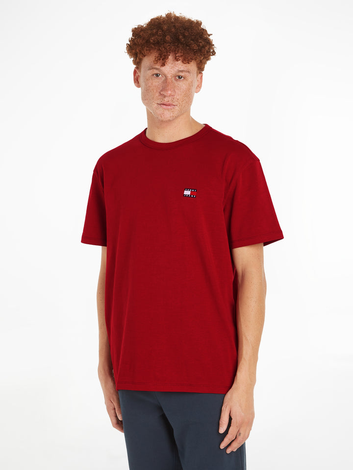 TJM REG BADGE TEE EXT - MAGMA RED